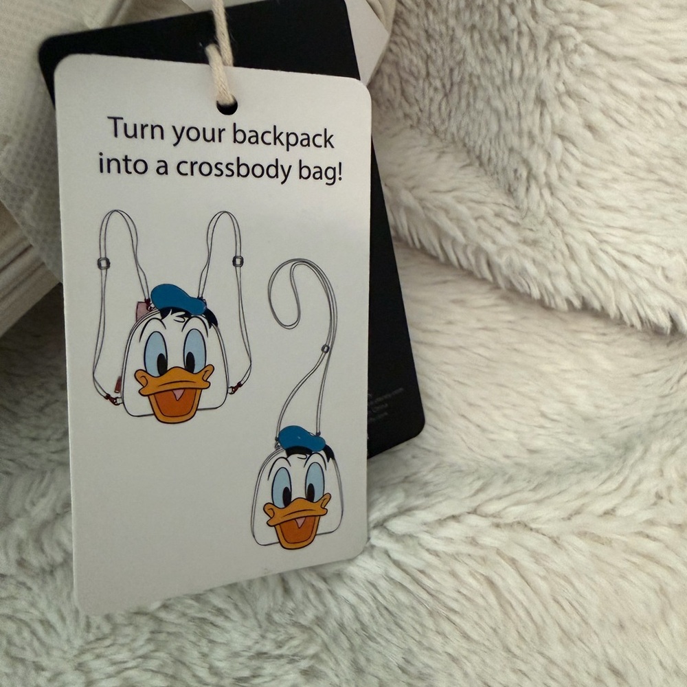 Reversible Donald & Daisy Loungefly backpack/crossbody. - Picture 3 of 13